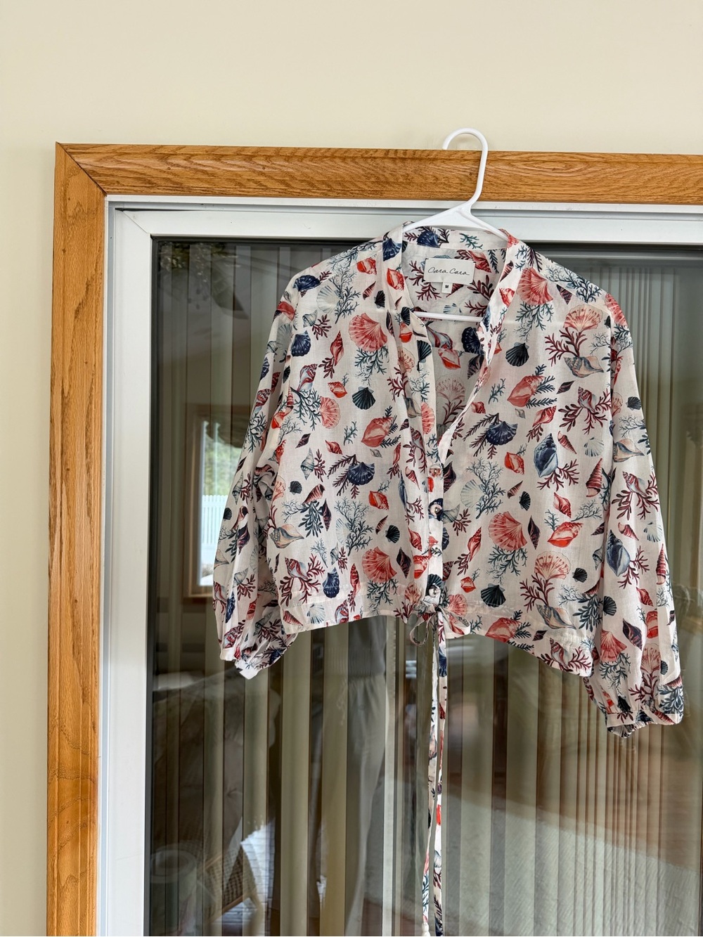 Cara Cara Cropped White Tie-Waist Blouse with Navy & Coral Seashell Print